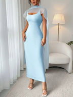 Women's ribbed scoop neck bodycon maxi dress by Trendsi, elegant stretch floor-length dress with a fitted silhouette and scoop neckline.