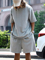 Men's relaxed fit T-shirt and shorts set in plus size, casual men's tops by Trendsi, shown in a comfortable, full-size outfit.