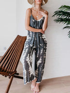 Plus size tie-dye wide leg jumpsuit by Shopimist, full-length view showcasing vibrant colorful pattern and relaxed fit.