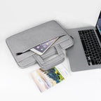 Plush Fashion Hub laptop bag and business briefcase with multiple compartments, black nylon exterior, and padded shoulder strap.