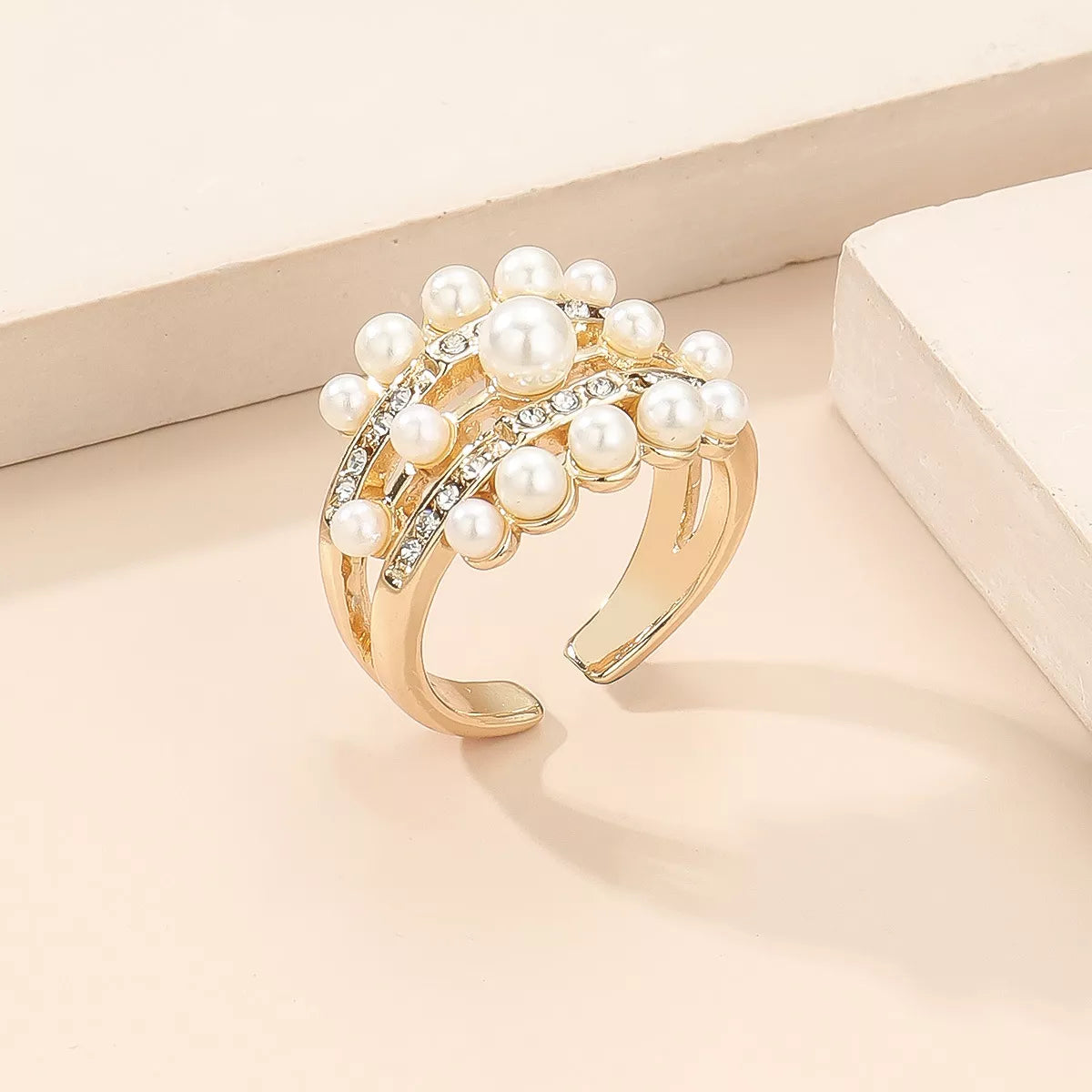 18K gold-plated open pearl ring with a sleek band and a single pearl accent, stylish jewelry by Plush Fashion Hub