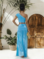 Plush Fashion Hub one-shoulder top and ruched maxi skirt set, stylish coordinated outfit with elegant design and fitted silhouette.