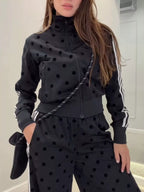 Polka dot zip-up outerwear and pants set by Plush Fashion Hub, featuring a matching stylish and comfortable design.