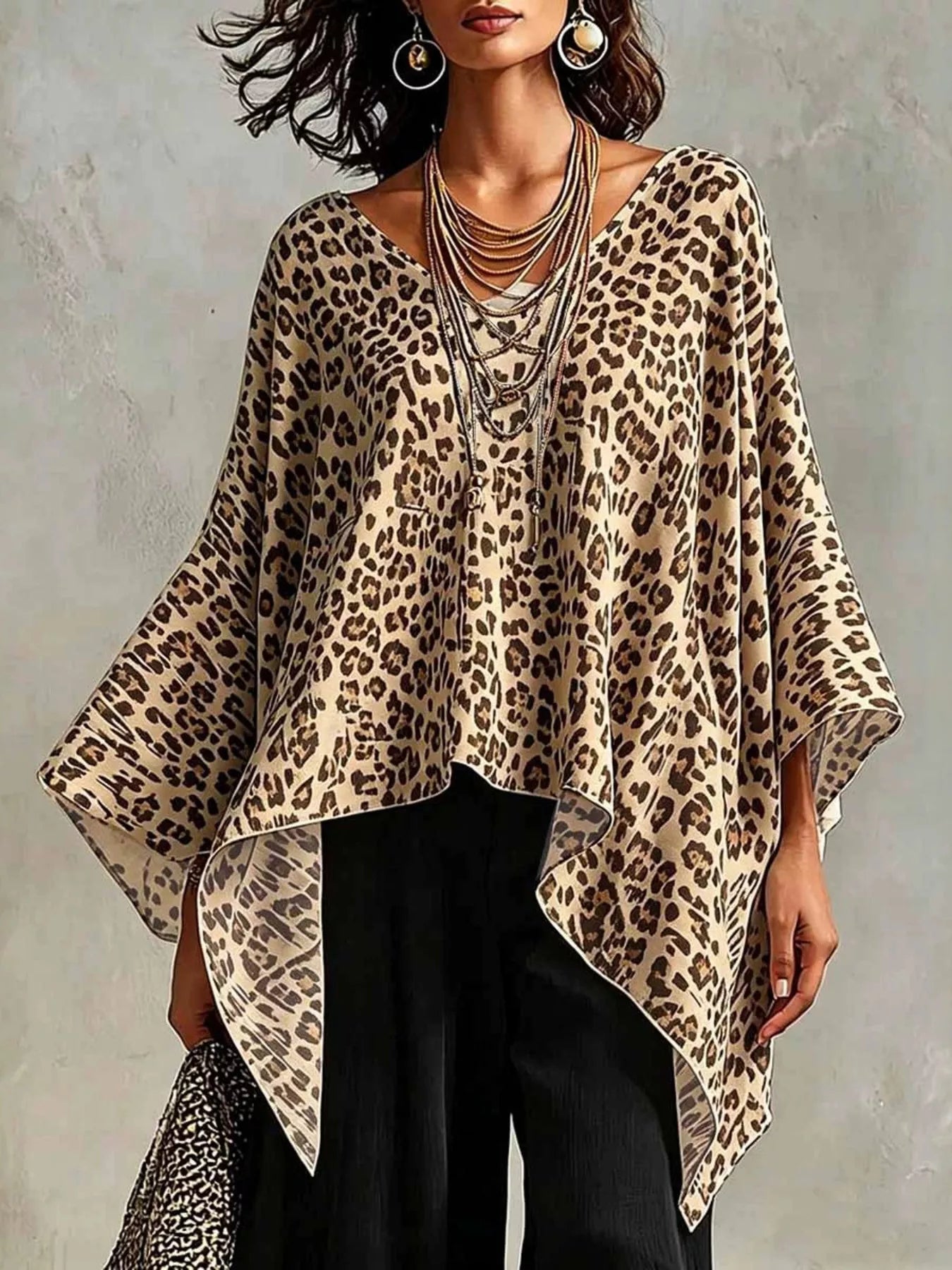 Plus size leopard print asymmetrical hem top by Plush Fashion Hub, featuring bold animal print and stylish asymmetrical design.