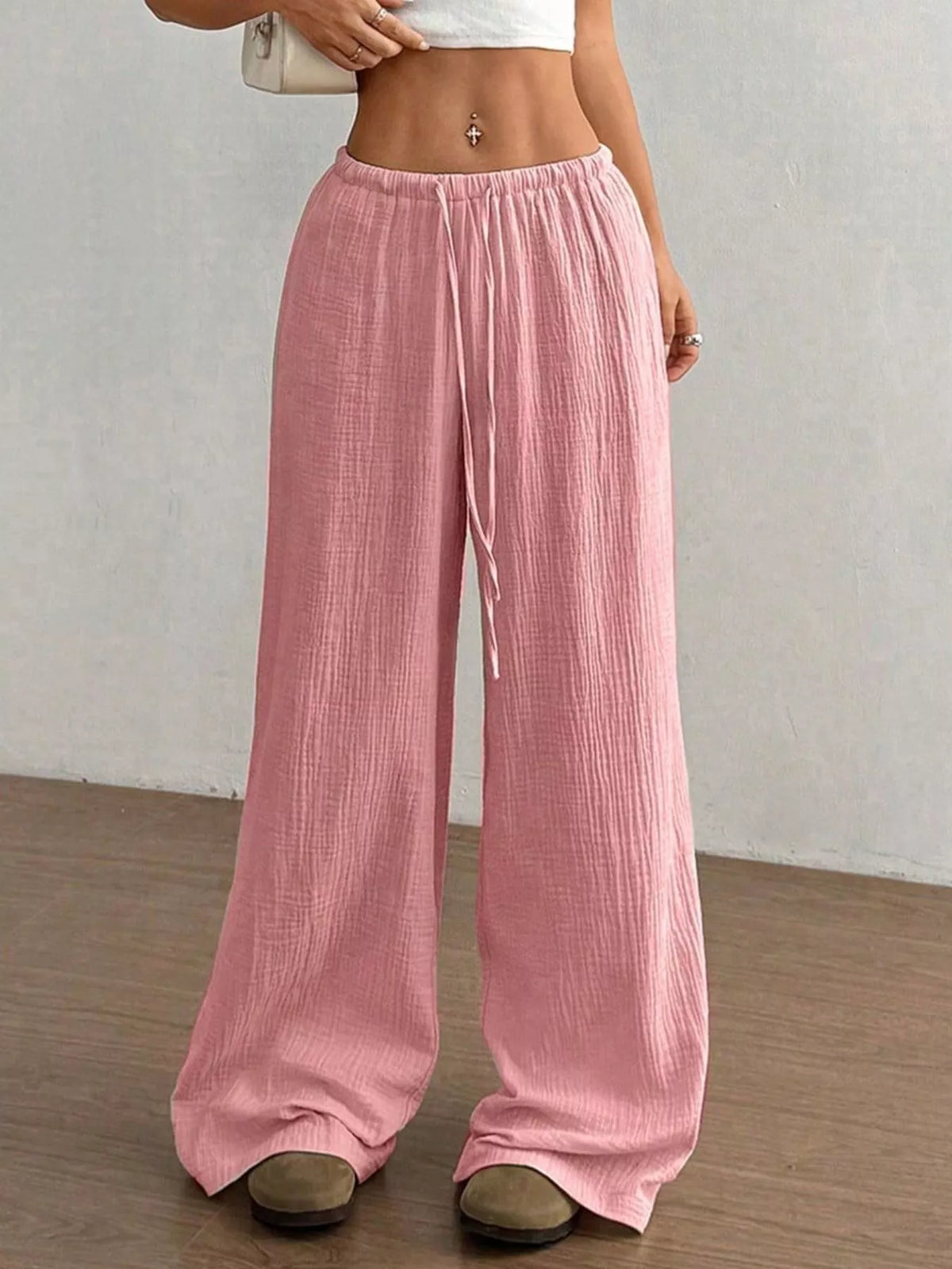 Plush Fashion Hub wide-leg drawstring pants in soft fabric, featuring a relaxed fit and comfortable waistband.