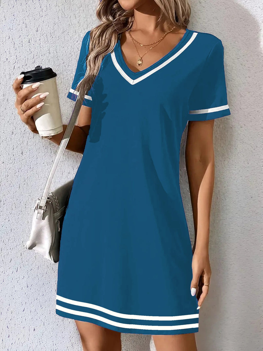 Women's contrast-color V-neck A-line dress by FitiqueFit featuring short sleeves and a mid-rise fit, displayed on a hanger.