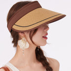 Women's wide brim straw visor hat by Trendsi, breathable UV sun protection accessory with a stylish, wide brim design.