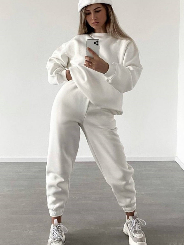 Women's loose fit crewneck sweatshirt and jogger pants two-piece set by Plush Fashion Hub, casual loungewear with comfortable fit.