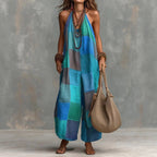 Women's plaid print jumpsuit by Plush Fashion Hub featuring sleeveless, wide-leg, suspender style in a stylish, casual design.