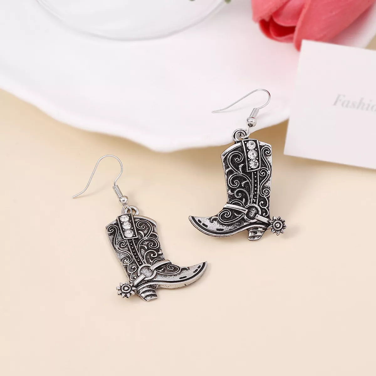 Vintage Western cowboy boot dangle earrings featuring detailed leather boot design, perfect for Western-inspired fashion accessories.