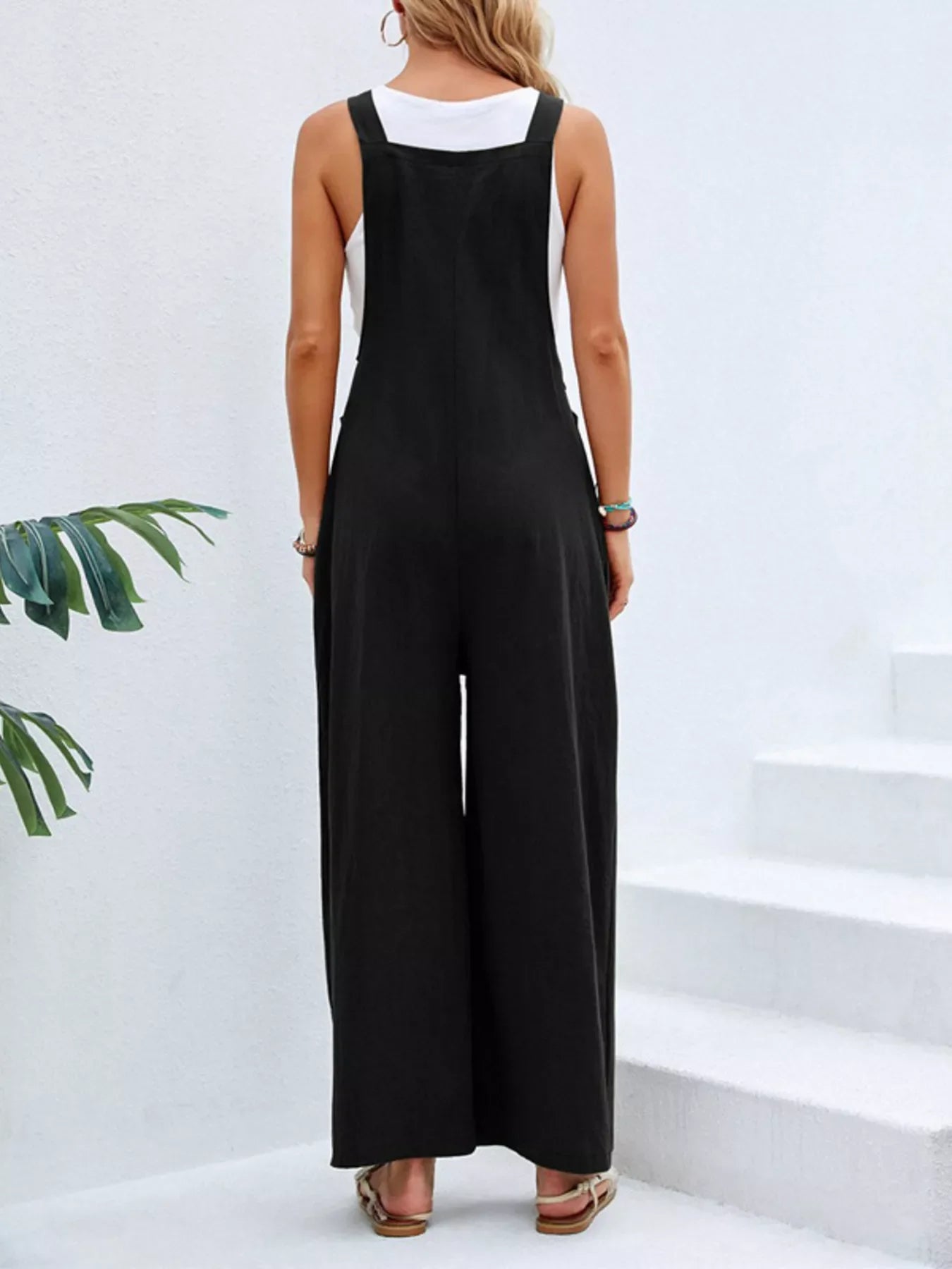 Plus size casual wide-leg overalls with pockets from Plush Fashion Hub, shown in a full-size view featuring a relaxed fit and functional pockets.