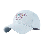 Embroidered cotton baseball cap by Trendsi, stylish athletic hat with detailed embroidery and comfortable fit.
