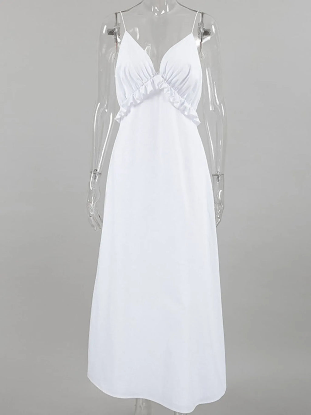 Women's ruffled V-neck cotton maxi dress from Trendsi, featuring a flowy boho style with ruffled details and a relaxed summer fit.