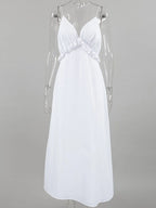 Women's ruffled V-neck cotton maxi dress from Trendsi, featuring a flowy boho style with ruffled details and a relaxed summer fit.
