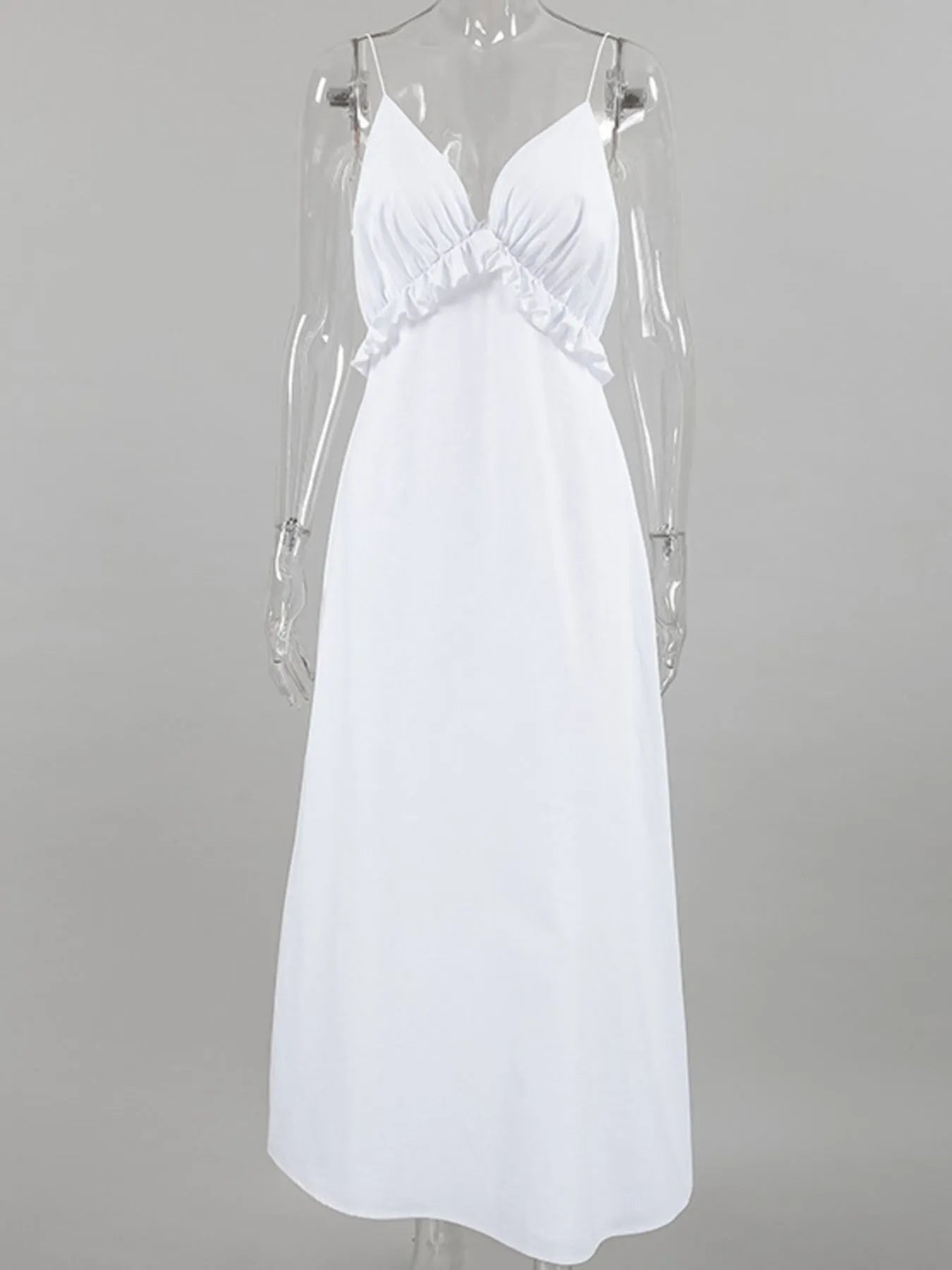 Women's ruffled V-neck cotton maxi dress from Trendsi, featuring a flowy boho style with ruffled details and a relaxed summer fit.