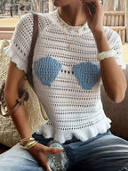Openwork ruffled hem knit top in a soft, lightweight fabric featuring delicate openwork details and a stylish ruffled hem.