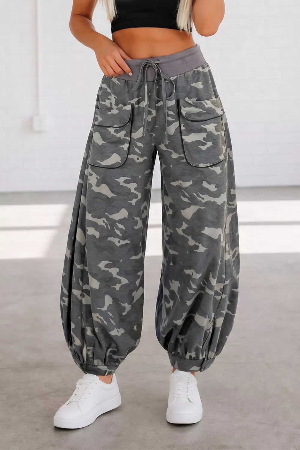 Multicolour camouflage cargo barrel pants with drawstring contrast waistband by Plush Fashion Hub, shown from front view.