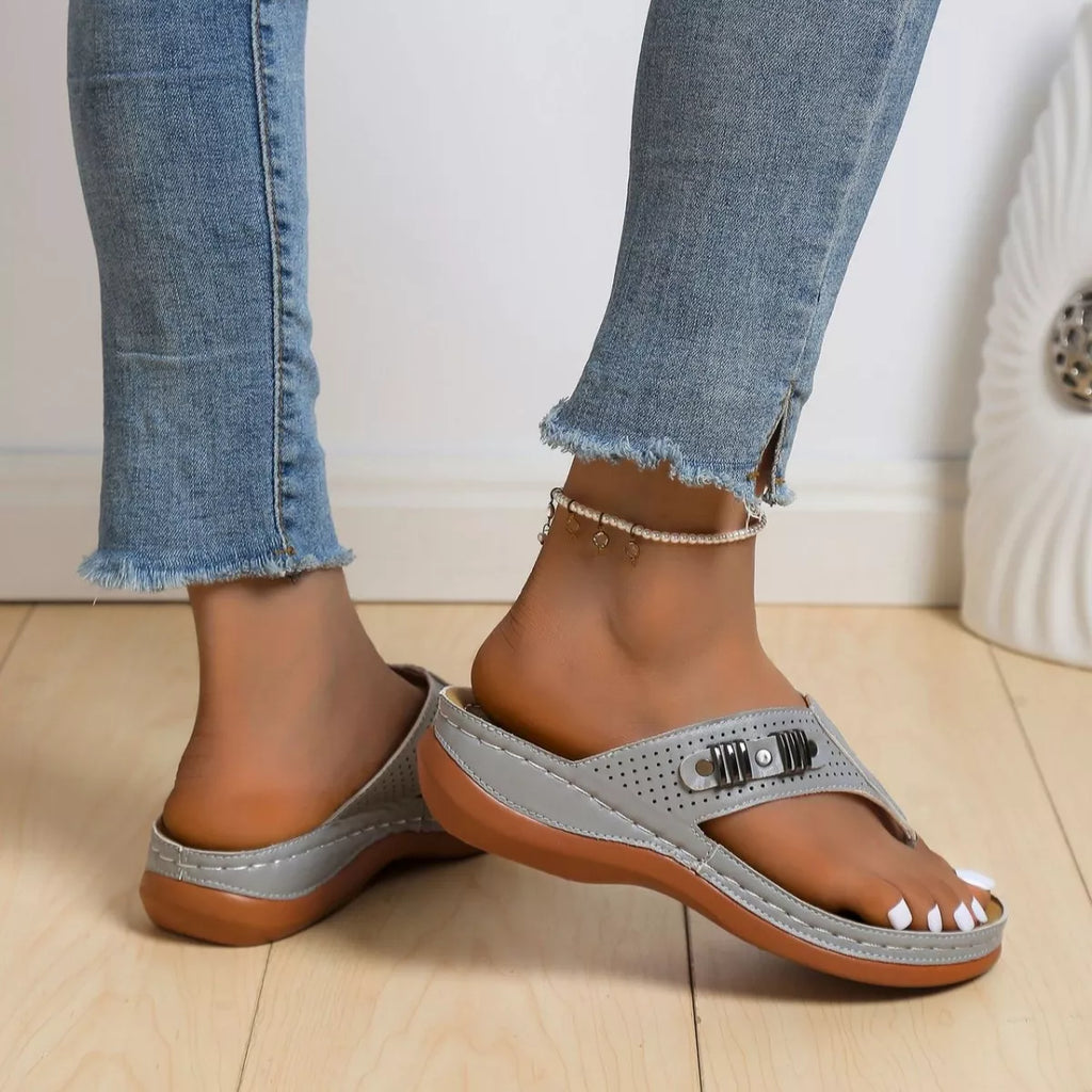 Women's trendy wedge sandals with toe post design from Trendsi, featuring comfortable summer footwear with stylish strappy details.