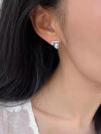 Shopimist zircon pearl stud earrings featuring sparkling faux pearls and shiny metal settings on a white background.