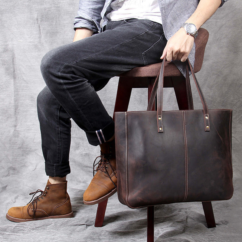 Simple retro first layer cowhide large-capacity men's handbag with multiple compartments, stylish and durable by Plush Fashion Hub.