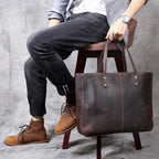 Simple retro first layer cowhide large-capacity men's handbag with multiple compartments, stylish and durable by Plush Fashion Hub.