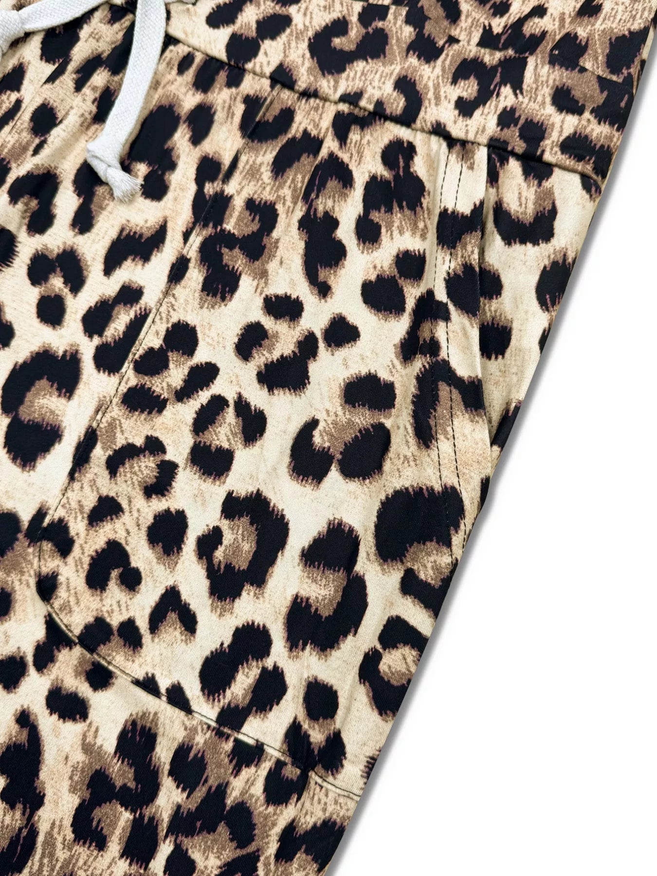 Leopard print one-shoulder top and matching pants set by Simply Love, featuring stylish animal print fabric and modern design.