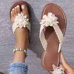 Shopimist flower toe post sandals featuring colorful floral straps and a comfortable flat sole.
