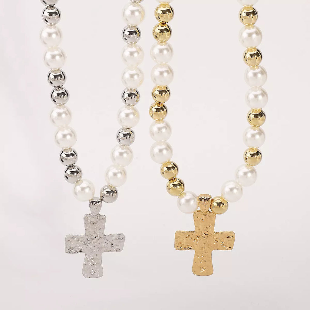 Pearl and cross pendant necklace featuring a elegant pearl and metal cross charm, crafted by Shopimist.
