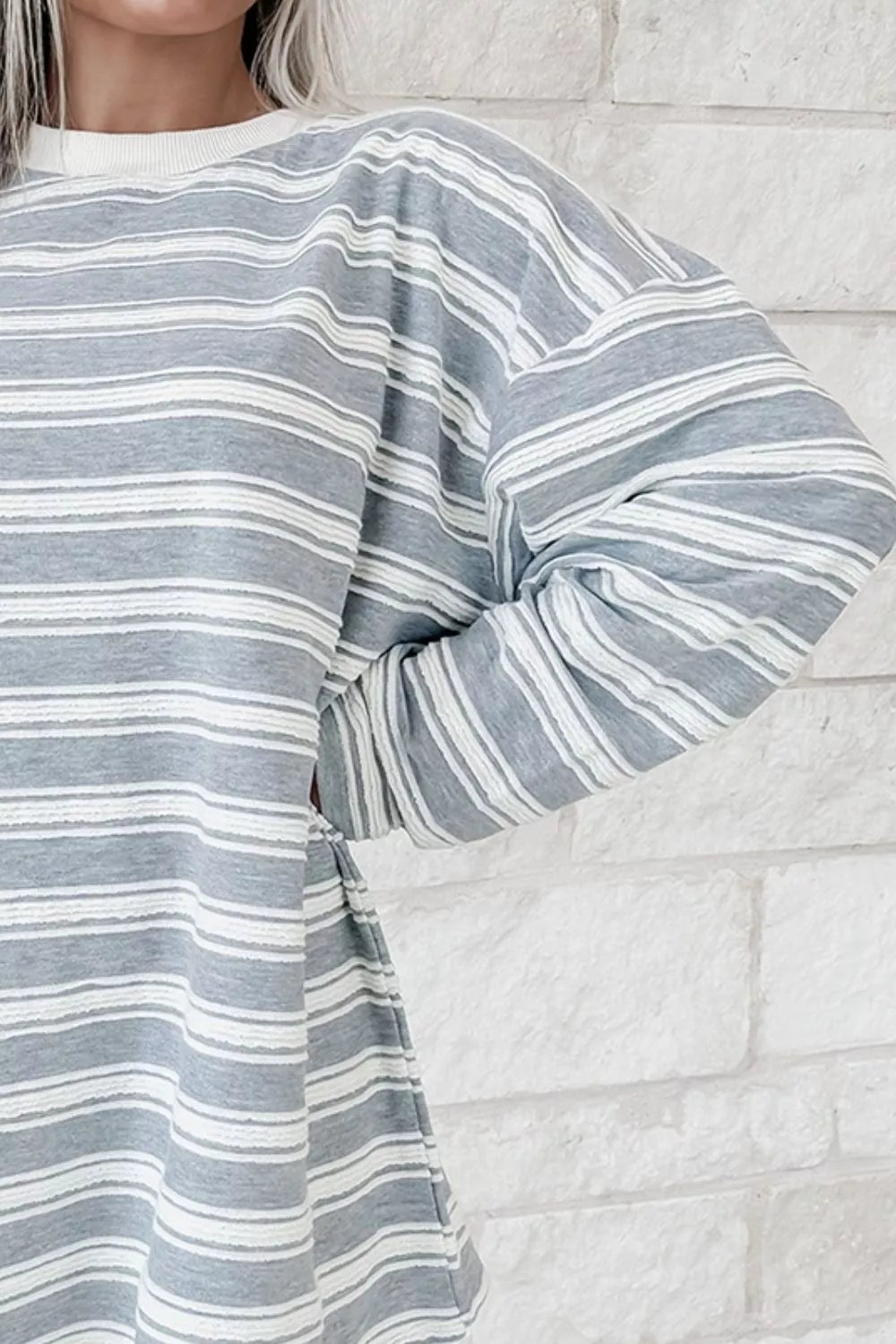 Women's oversized striped long sleeve T-shirt by Trendsi, featuring a relaxed fit and bold horizontal stripes.