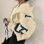 Women’s zip-up printed sweatshirt hoodie by FitiqueFit with long sleeves, casual jacket style, featuring colorful print design.
