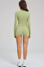 Fitglutes Activewear Sizzle Zip Jacket, sports bra, and shorts 3-piece set, shown on a model for gym and workout attire.