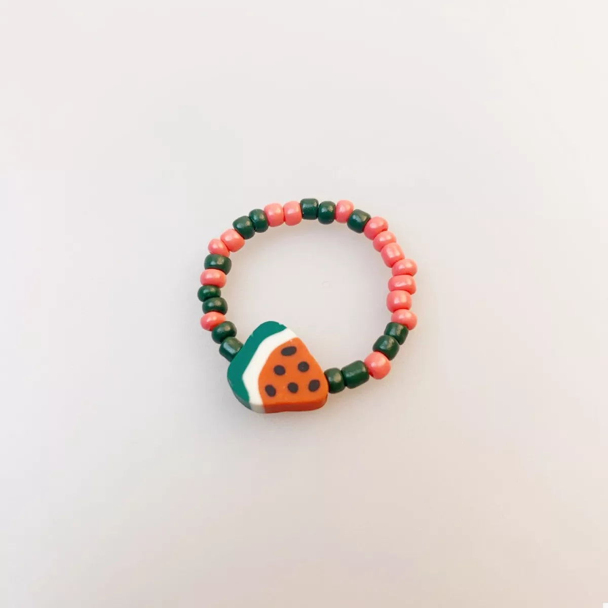 Colorful fruit charm beaded ring featuring vibrant beads and playful fruit designs, perfect for casual or fun accessories.