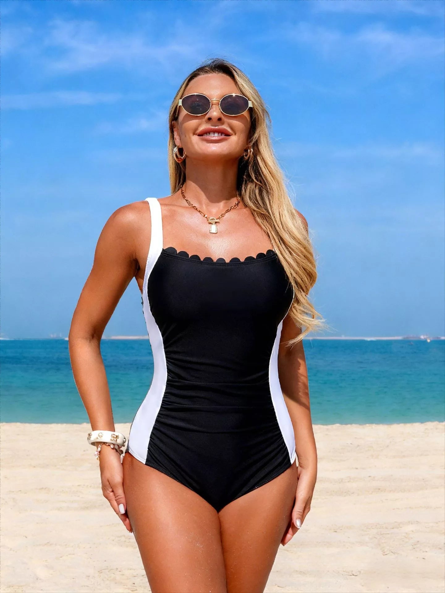 Two-tone ruched one-piece swimsuit with tummy control from Trendsi, featuring flattering design and stylish swimwear for women.