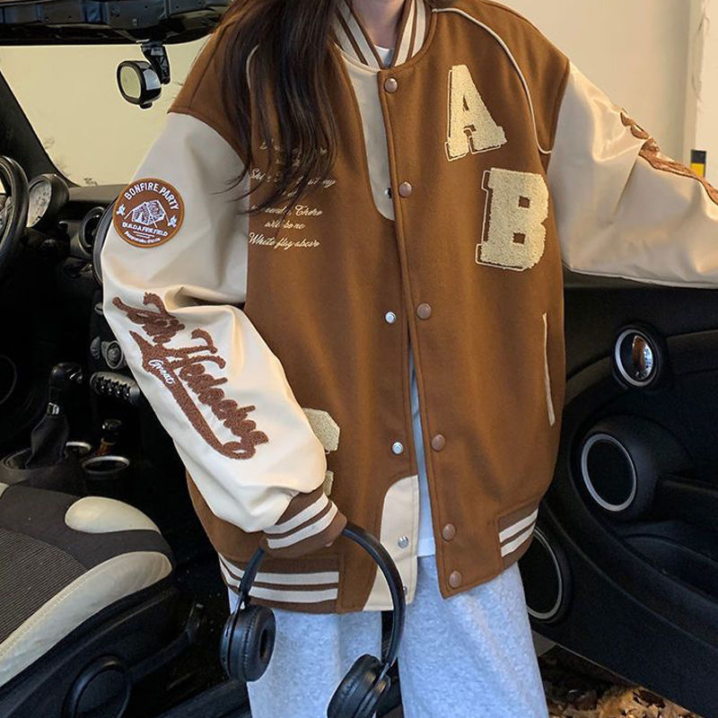 Oversized Y2K lamb-wool bomber jacket for women, streetwear style, in neutral tones, with ribbed cuffs and collar, by FitiqueFit.