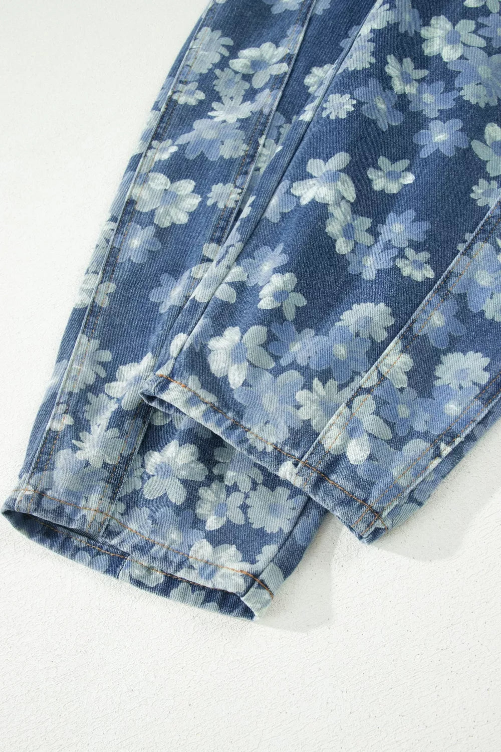 Dainty floral printed drawstring barrel jeans from Plush Fashion Hub featuring a relaxed fit with floral design and adjustable waist.