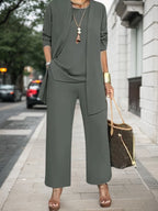 Women’s elegant 3-piece outfit set by FitiqueFit featuring a solid color coat and casualwear ensemble on a mannequin.