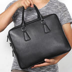 Men's leather briefcase by Plush Fashion Hub with cowhide material, large capacity, horizontal design, and professional style.