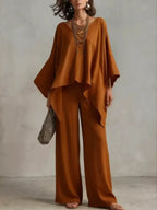 Plus size Trendsi loungewear set featuring a V-neck top and matching pants, comfortable and stylish for relaxing or casual wear.