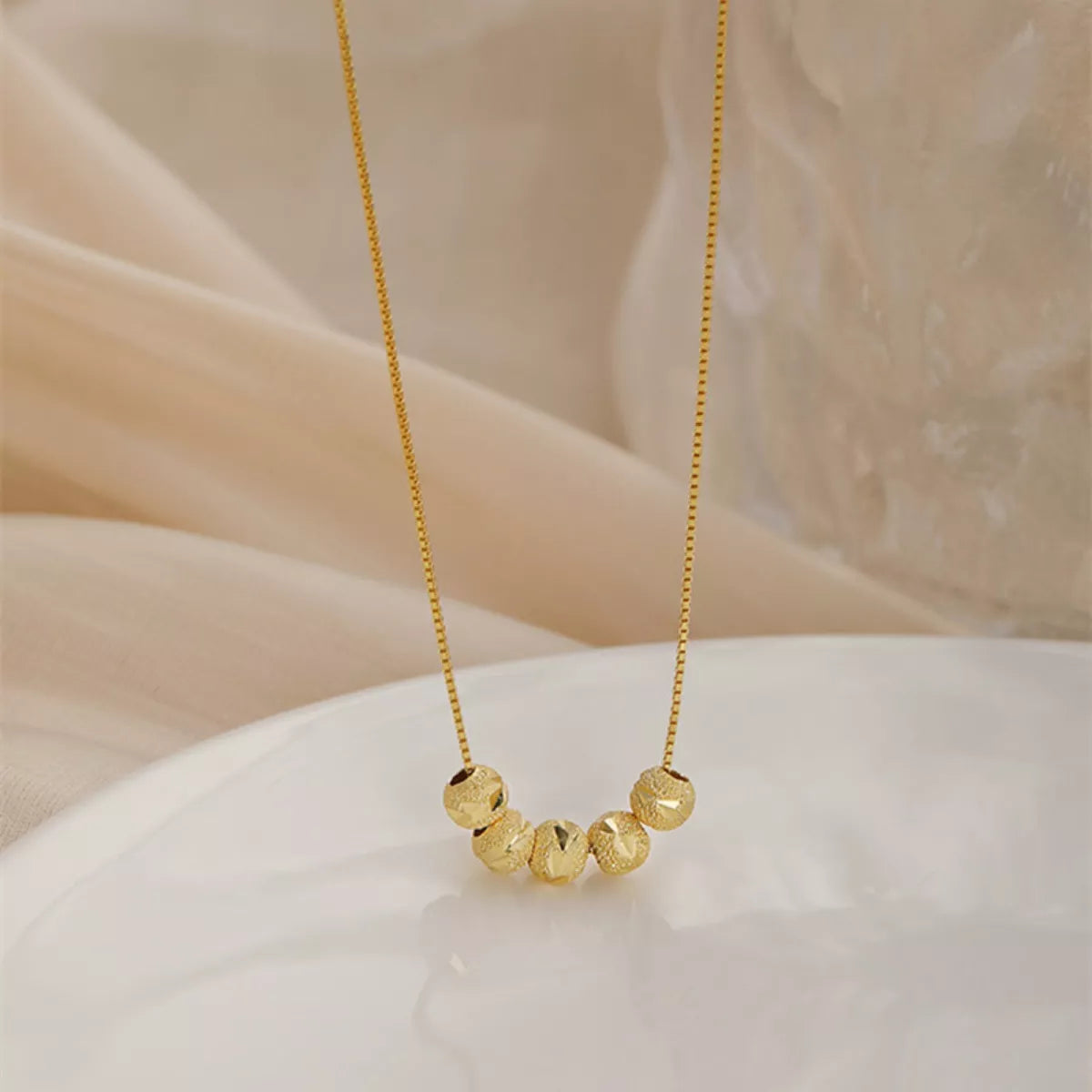 Sterling silver beaded necklace with round beads, stylish jewelry piece from Plush Fashion Hub for elegant everyday wear