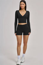 Fitglutes Activewear long sleeve crop top featuring a snug fit, soft fabric, and stylish design for workout and gym wear.