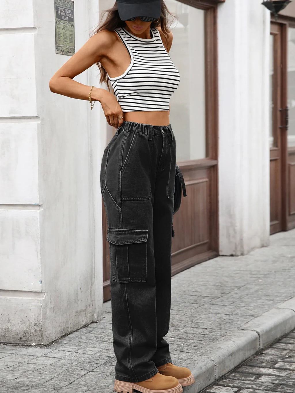 High-waisted cargo jeans by Plush Fashion Shop featuring durable denim fabric and multiple cargo pockets.