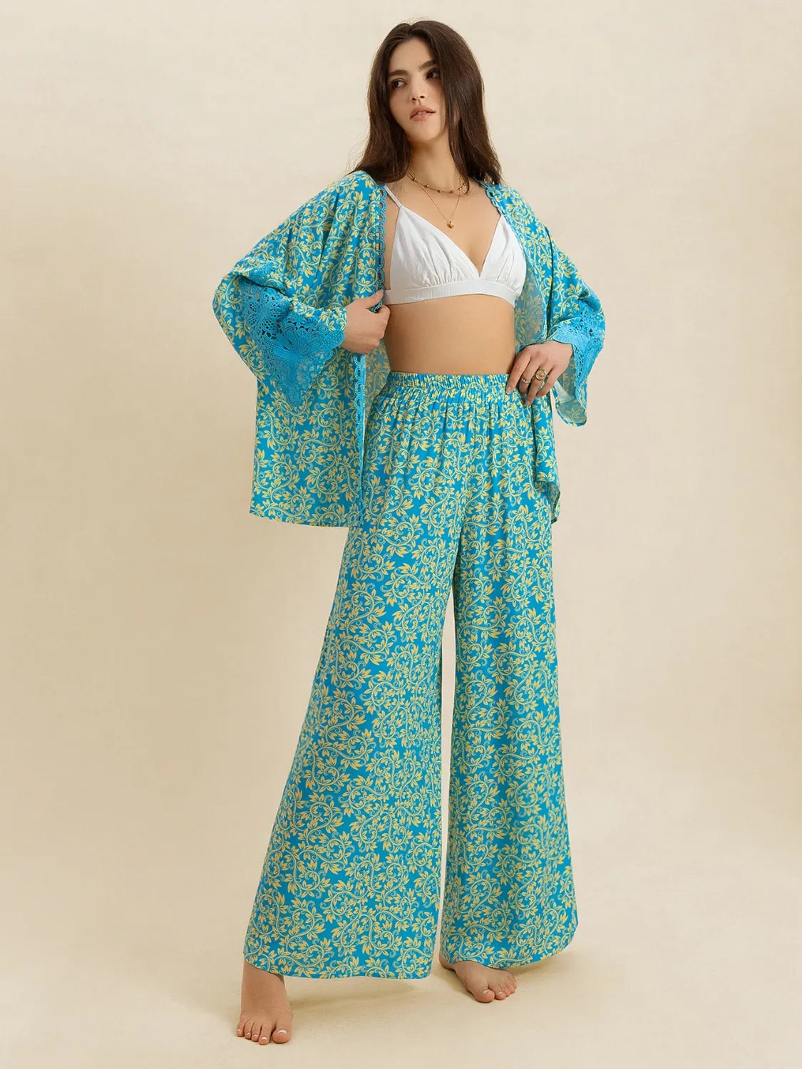 Open front printed matching top and pants set by Plush Fashion Hub, featuring a stylish coordinated outfit with colorful patterns.