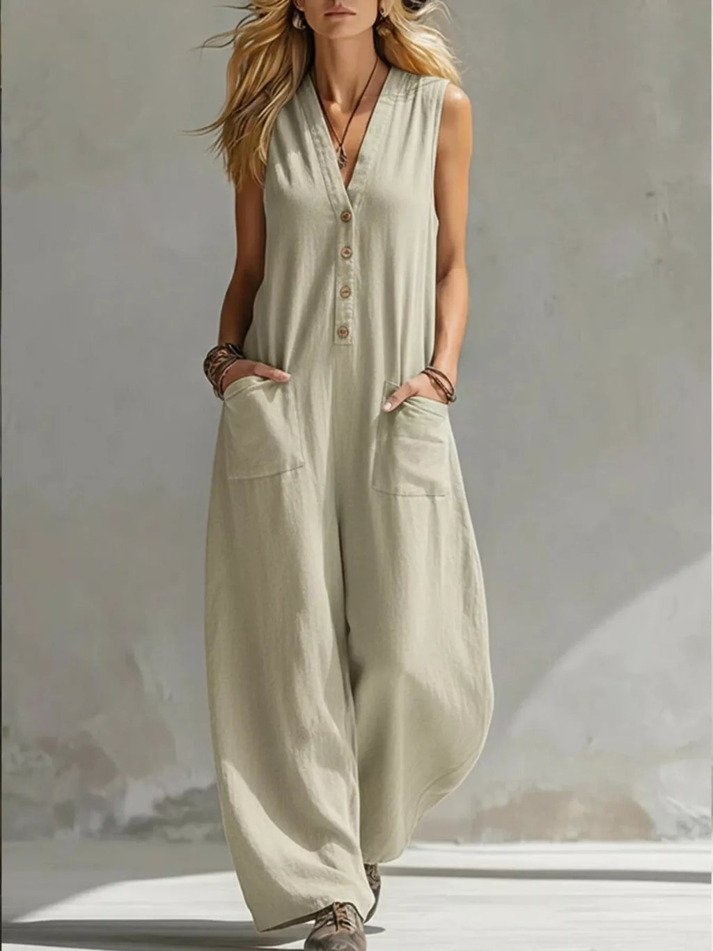 Plus size Shopimist v-neck sleeveless wide-leg jumpsuit displayed on a model, highlighting its relaxed fit and stylish design.