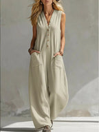 Plus size Shopimist v-neck sleeveless wide-leg jumpsuit displayed on a model, highlighting its relaxed fit and stylish design.