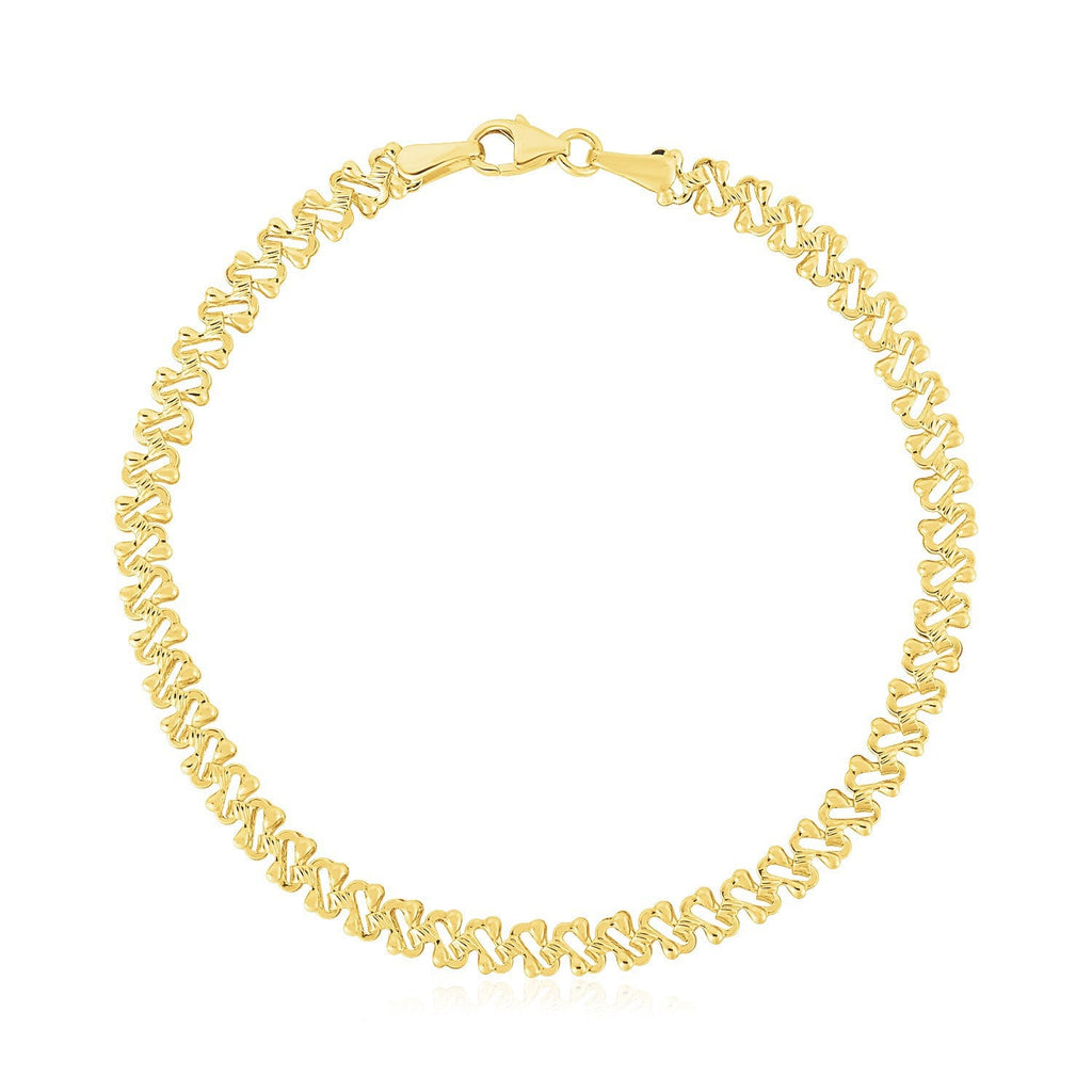 14k yellow gold high polish textured fancy chain bracelet with 4mm links, showcasing a stylish and elegant jewelry design.