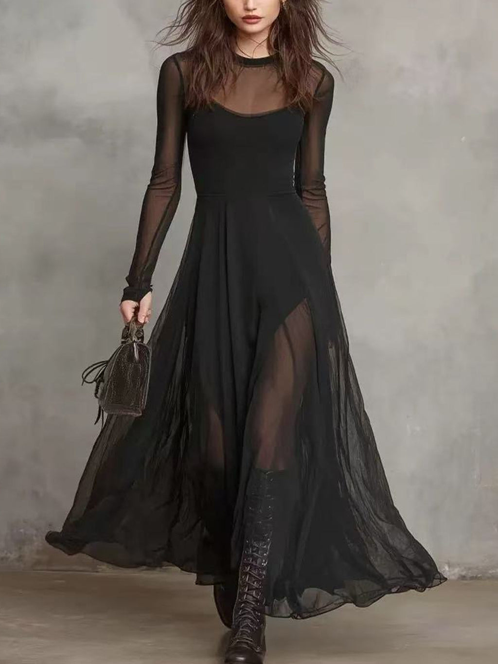 Elegant sheer mesh two-piece maxi dress set by Trendsi, featuring a flowing skirt and matching top with delicate see-through fabric.
