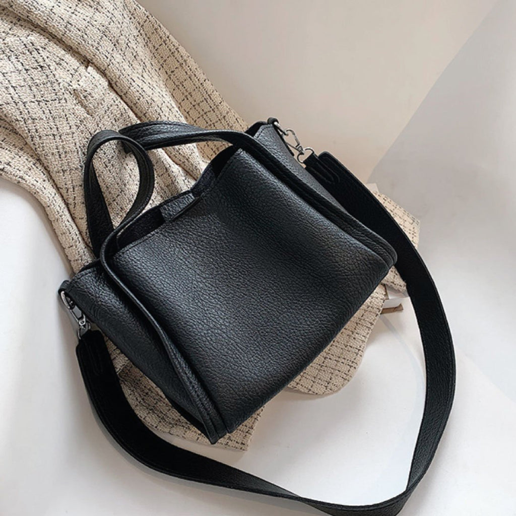 Plush Fashion Hub Kira Handbag in soft beige with gold hardware, featuring a sleek design and top handle for versatile style.