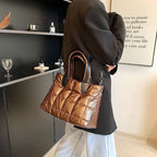 Fashionable plaid stitching women’s shoulder purse with stylish design and adjustable strap, perfect for everyday use.