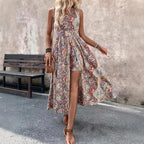 Women's printed V-neck sleeveless jumpsuit by Plush Fashion Hub, featuring casual chic style with vibrant vacation-inspired patterns.