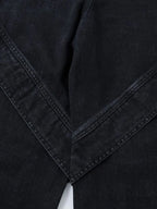 Men's wide leg denim jeans from Plush Fashion Shop, showing the relaxed fit and classic blue denim fabric.